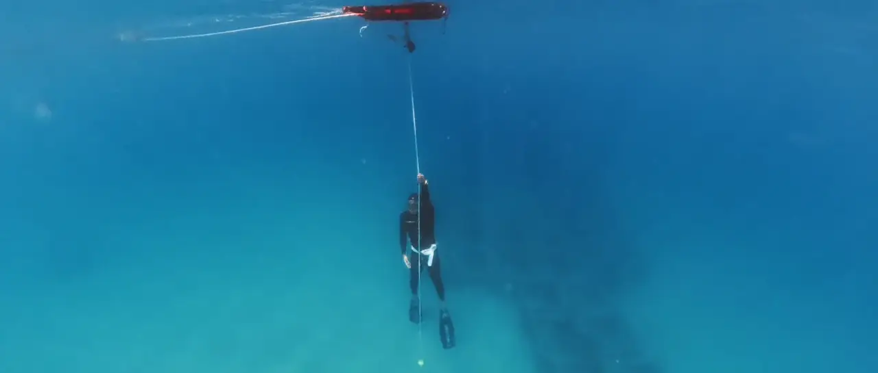 PADI Freediver Course student descending underwater in Koh Tao